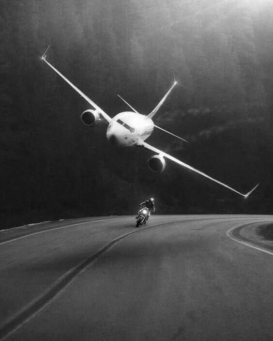 Aircraft in motion, black and white